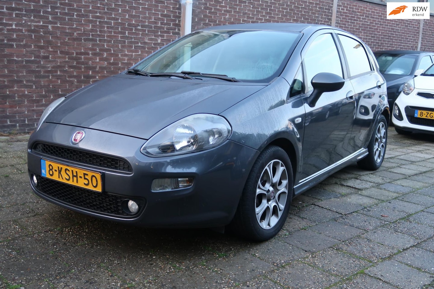 Fiat Punto Evo - 1.3 M-Jet Lounge 1.3 M-Jet Lounge - AutoWereld.nl