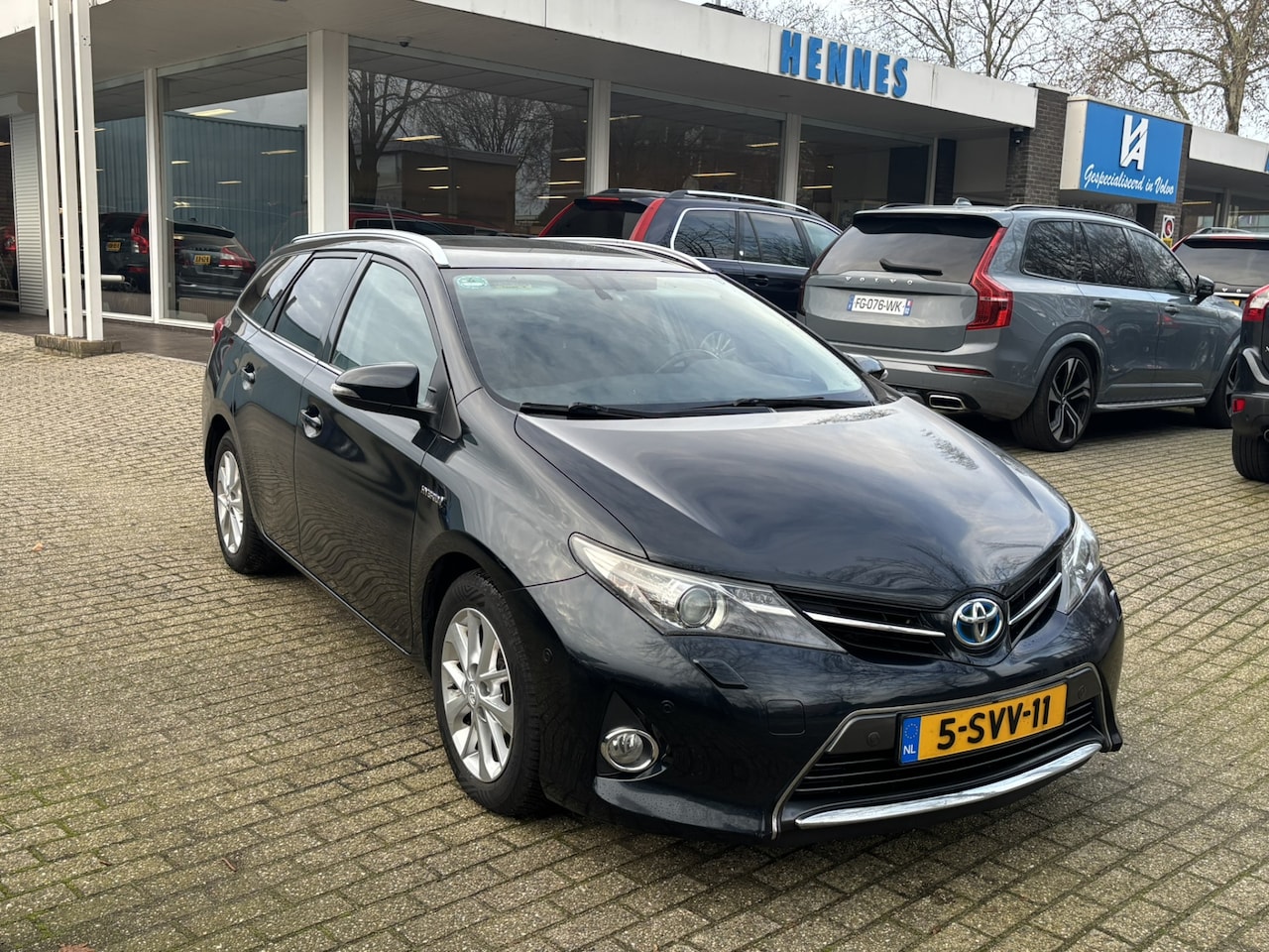 Toyota Auris Touring Sports - 1.8 Hybrid Lease+ Pano Xenon Stoelverwarming - AutoWereld.nl