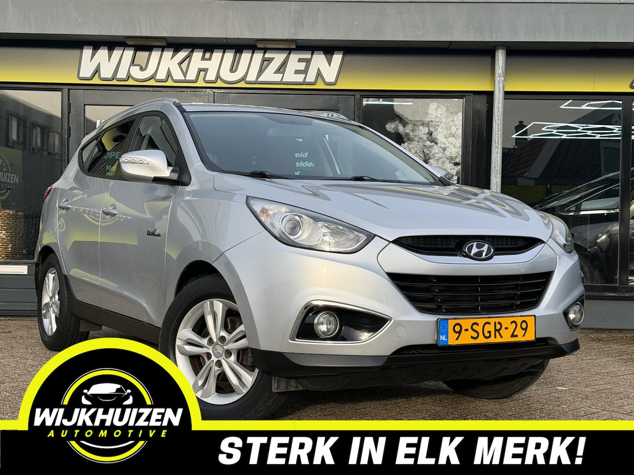 Hyundai ix35 - 1.6i GDI Business Edition met Climate !!! Navigatie !!! Nap !!! - AutoWereld.nl