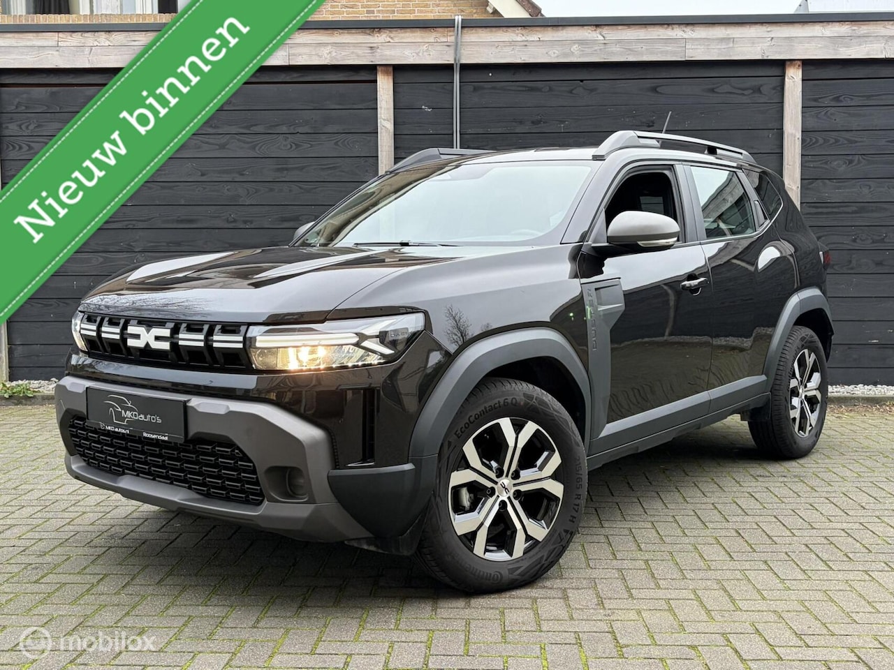 Dacia Duster - 1.2 TCe 130 PK mild hybrid Expression FM nav / 17" / Camera / 14.330 KM!!! - AutoWereld.nl