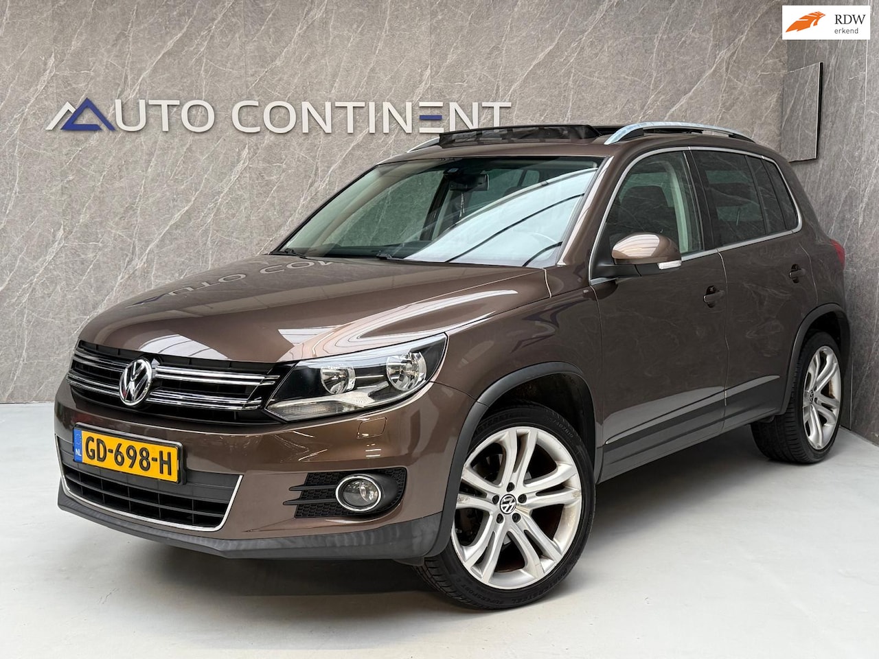 Volkswagen Tiguan - 2.0 TSI Sport&Style 4Motion / AUT / Panorama - AutoWereld.nl