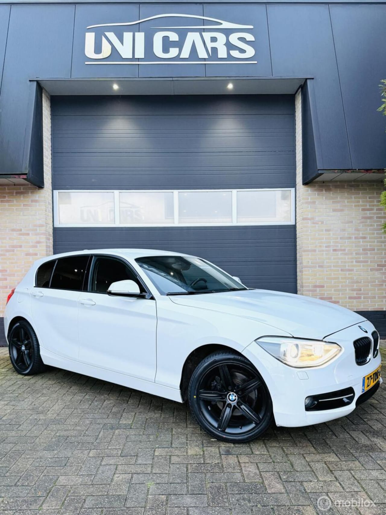BMW 1-serie - 118i 170 PK Sport|Automaat|Xenon|Navi|LM 17 - AutoWereld.nl