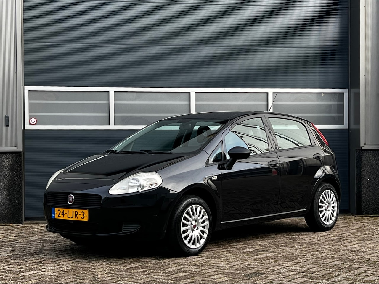 Fiat Grande Punto - 1.2 Actual bj.2010 Airco|5 Drs|Nap. - AutoWereld.nl