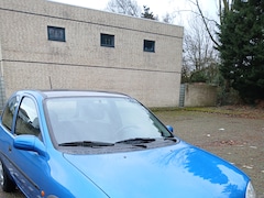Opel Corsa - 1.4i Strada