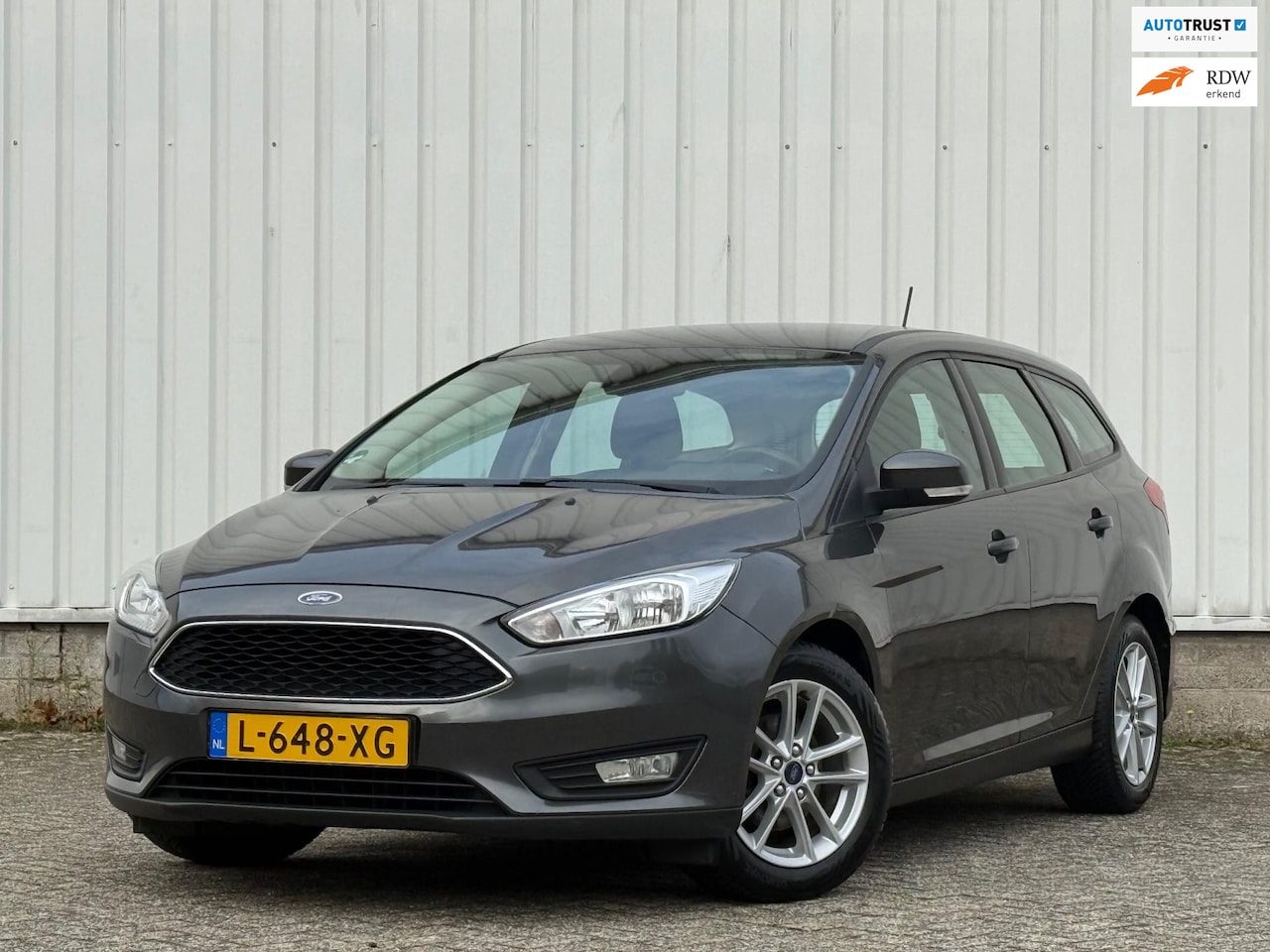 Ford Focus Wagon - 1.0 (125PK)2e Eigenaar,Trekhaak,climateControle,CruiseControle,ElektrischeRamen,Apk tot 15 - AutoWereld.nl