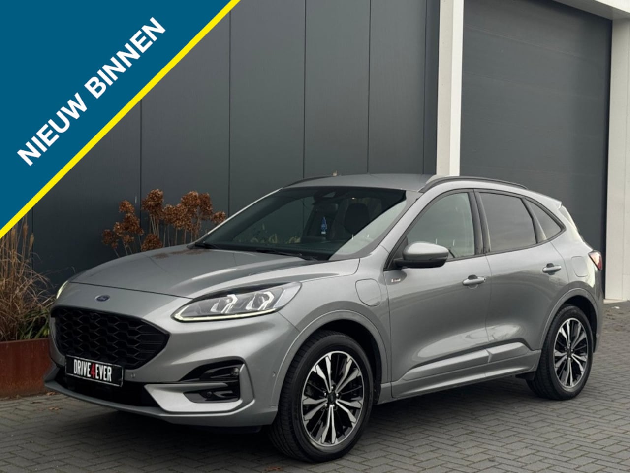 Ford Kuga - 2.5 PHEV ST-Line M22 NAVI CAMERA PDC LED LEDER SPORTVELGEN - AutoWereld.nl