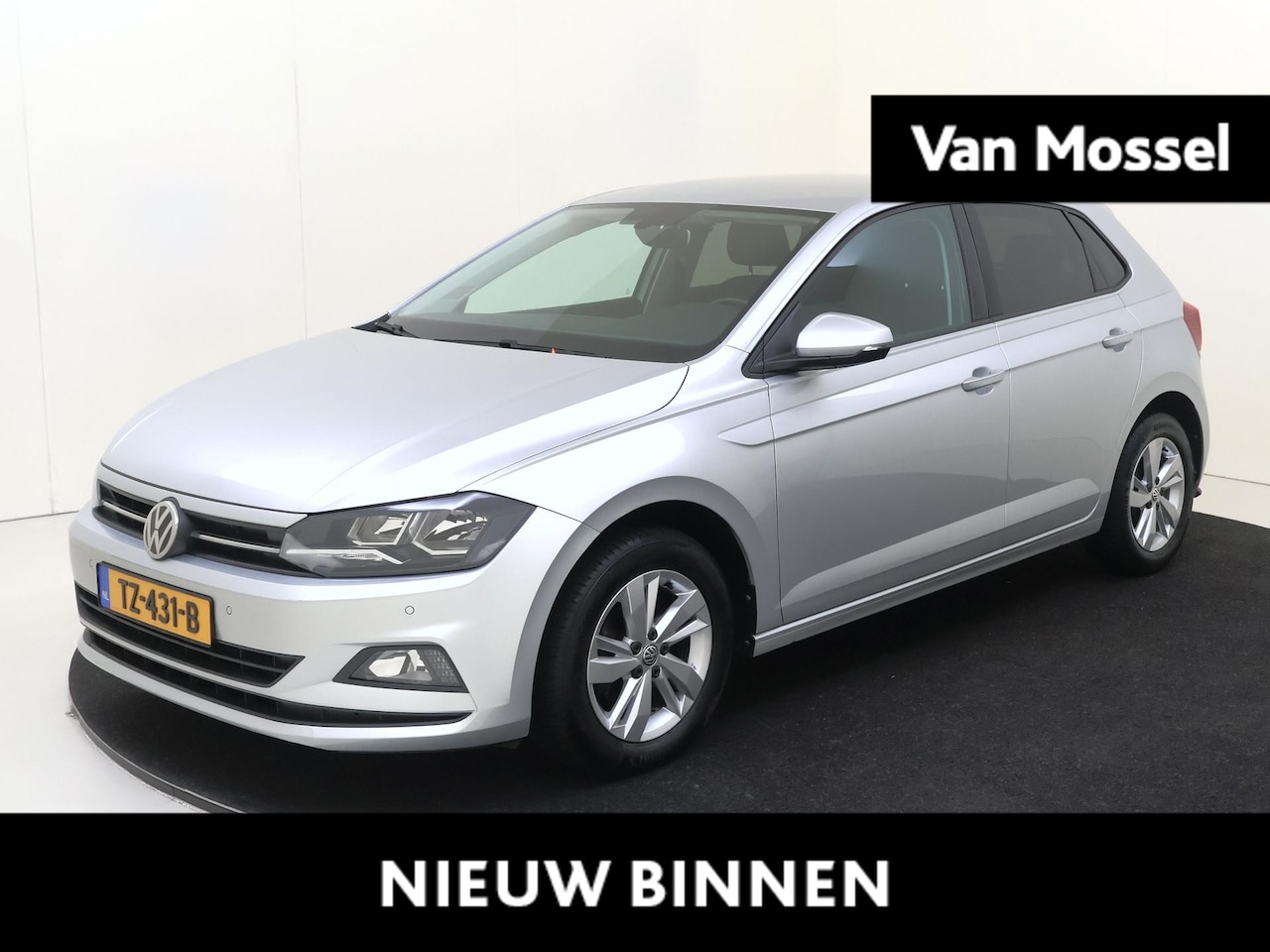 Volkswagen Polo - 1.0 TSI Comfortline | Navi / PDC Achter / Airco / LM Velgen - AutoWereld.nl