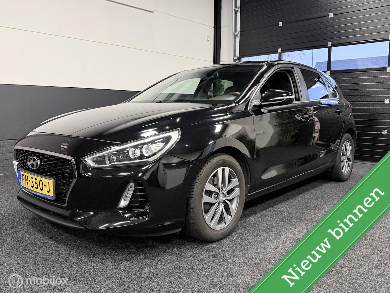 Hyundai i30 - 1.0 T-GDI Premium NAVI / CARPLAY / CAMERA / CRUISE / CLIMATE / LED - AutoWereld.nl