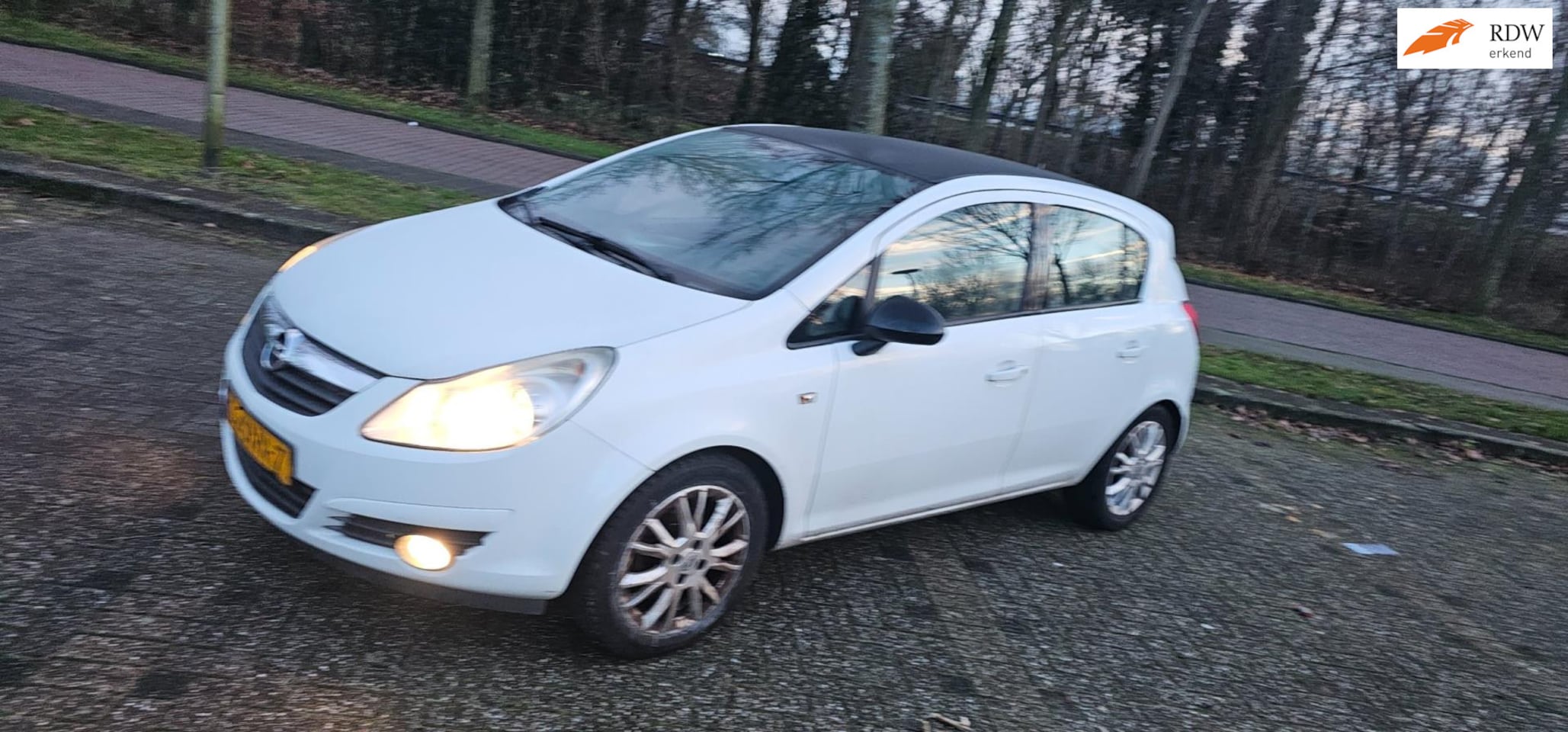 Opel Corsa - 1.4-16V Enjoy 1.4-16V Enjoy - AutoWereld.nl