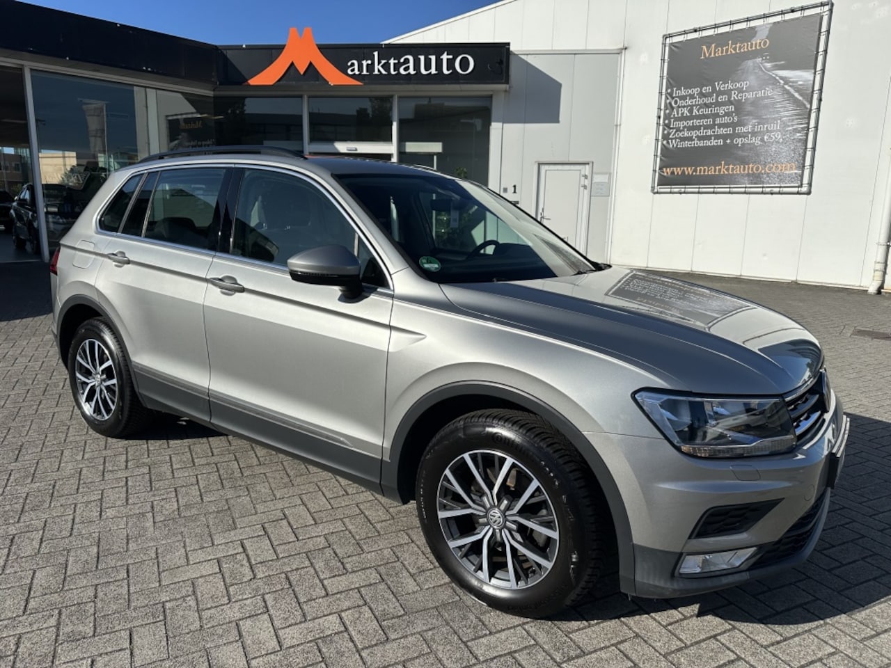 Volkswagen Tiguan - 1.4 TSI ACT Comfortline Trekhaak Navi Adaptive Cruise Parkeersen - AutoWereld.nl