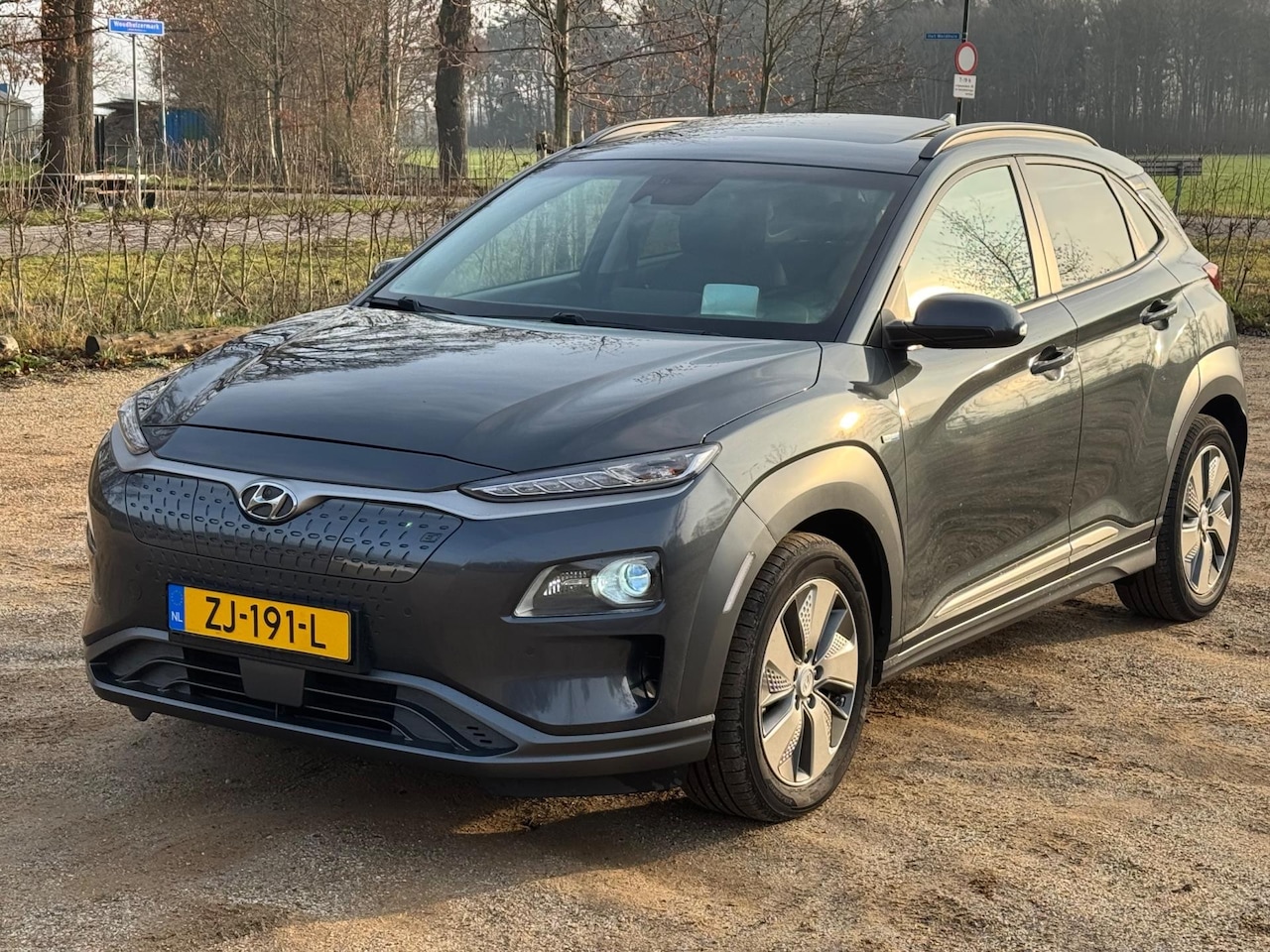 Hyundai Kona Electric - EV Premium 64 kWh *PANORAMA/LEDER/NAVI/ CLIMA - AutoWereld.nl
