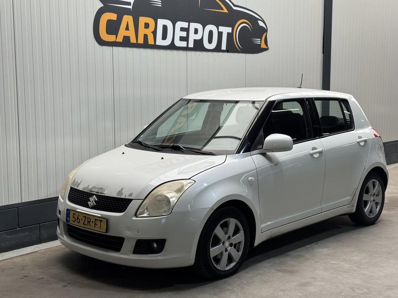 Suzuki Swift - 1.3 Shogun 1.3 Shogun - AutoWereld.nl