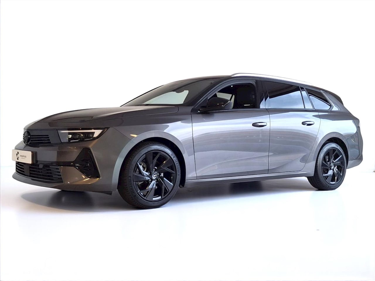 Opel Astra Sports Tourer - 1.2 Turbo 130pk Start/Stop Elegance AUTOMAAT NAVI CAMERA LED WINTERPACK - AutoWereld.nl