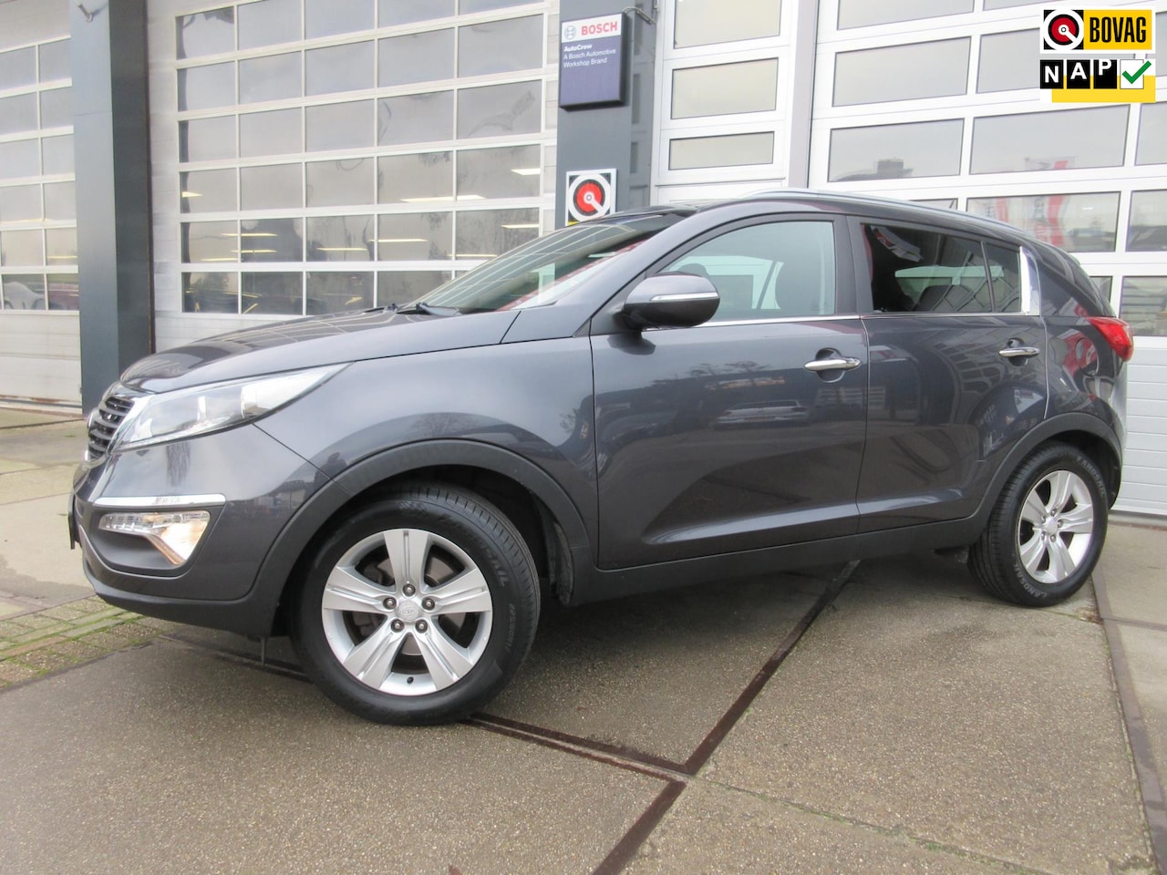 Kia Sportage - 2.0 Plus Pack / Camera / Trekhaak / PDC - AutoWereld.nl