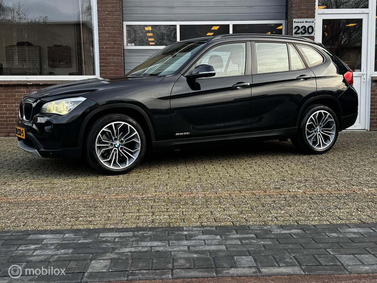 BMW X1 - sDrive20i HIGH EXE AUT LEDER/ECC-AIRCO/STOEL/VW/NAVI - AutoWereld.nl