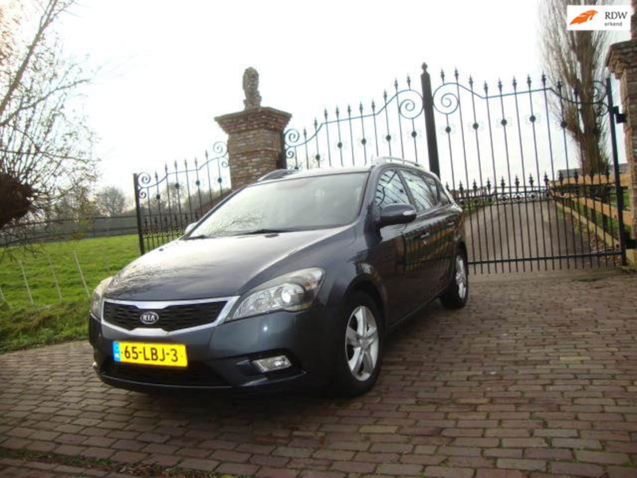 Kia Cee'd Sporty Wagon - 1.6 CVVT X-ecutive 1.6 CVVT X-ecutive - AutoWereld.nl