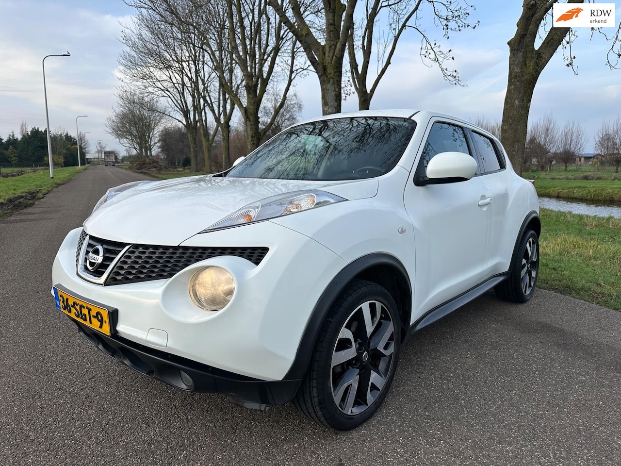 Nissan Juke - 1.6 Acenta Eco|navi|camera|trekhaak - AutoWereld.nl