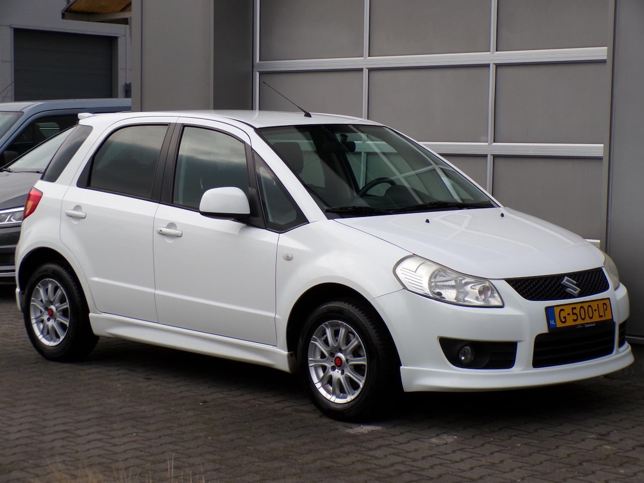 Suzuki SX4 - 1.6 Comfort|Stoelverwarming|Trekhaak|Airco|Camera - AutoWereld.nl
