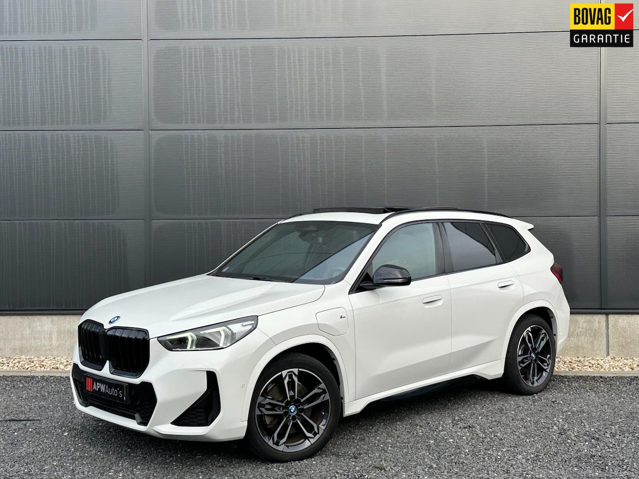 BMW X1 - XDrive30e Panodak | Leder/stof bekl. | Clima | ACC* | Stoel/stuur verw.* - AutoWereld.nl