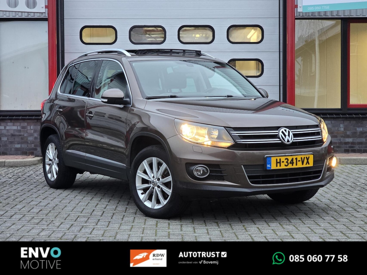 Volkswagen Tiguan - 2.0 TSI Sport&Style 4Motion Clima/Pano/LMV - AutoWereld.nl