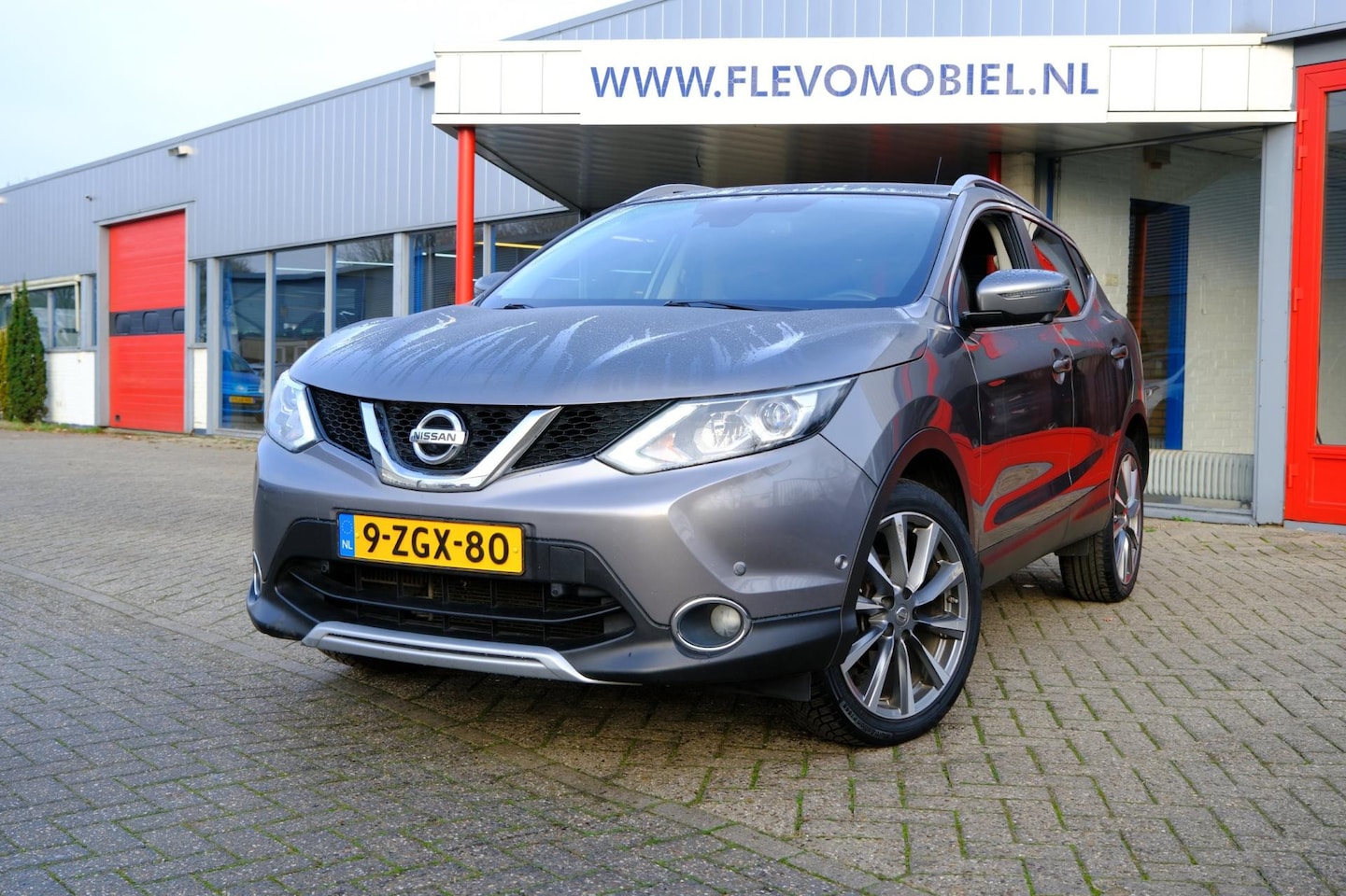 Nissan Qashqai - 1.2 Tekna Leder|Navi|Camera|PDC|Keyless - AutoWereld.nl