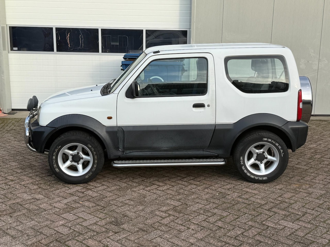 Suzuki Jimny - 1.3 JX 2WD 1.3 JX 2WD - AutoWereld.nl
