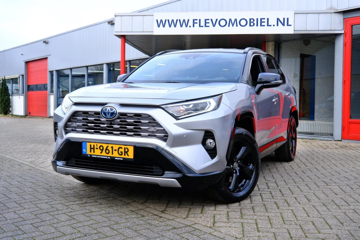 Toyota RAV4 - 2.5 Hybrid Aut. AWD Bi-Tone Navi|Camera|PDC|Leder|JBL Sound|Cruise - AutoWereld.nl