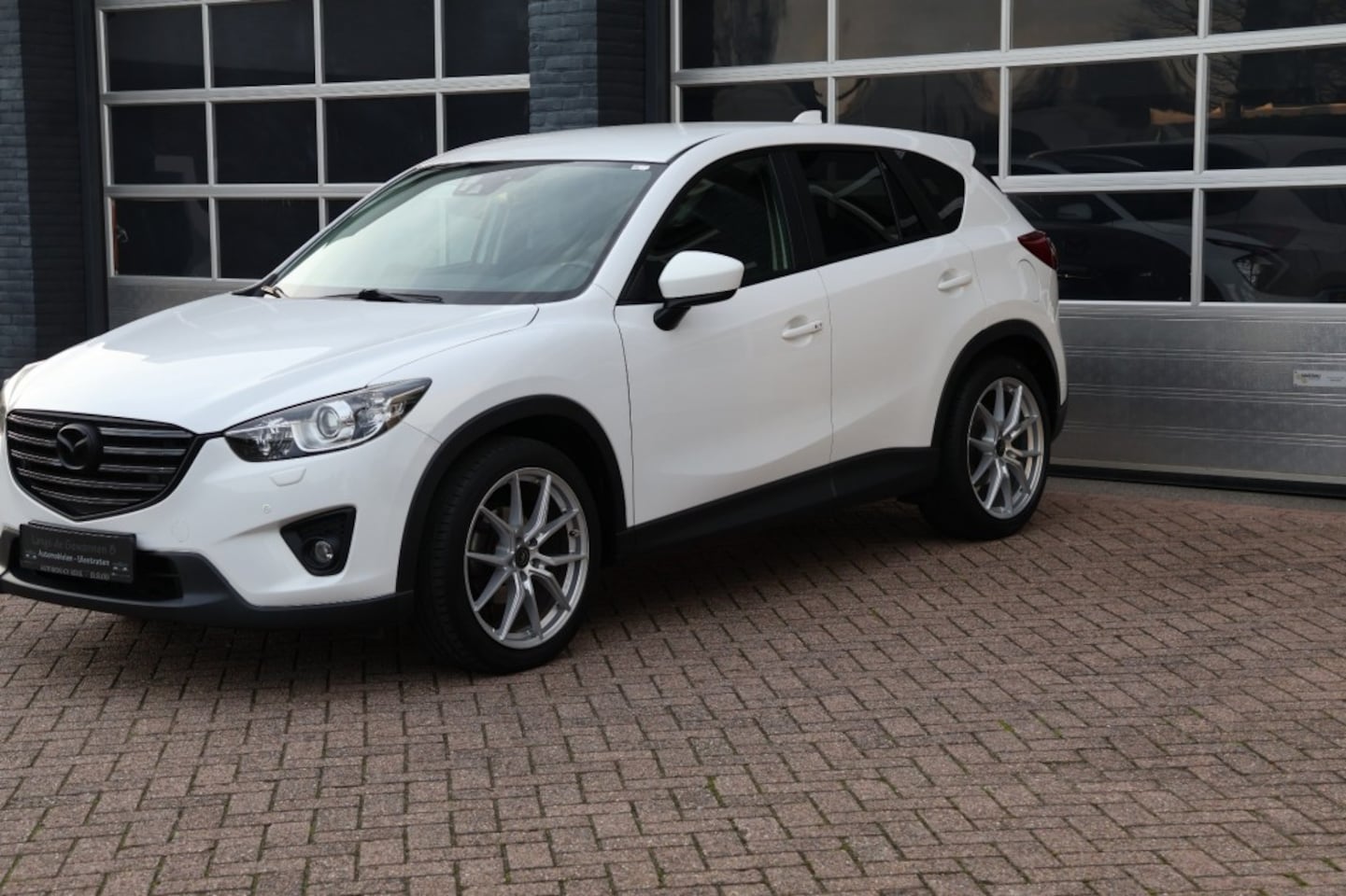 Mazda CX-5 - 2.0 SkyActiv-G 165 2.0 SkyActiv G-165, clima, Bose, navigatie, 74392 kilometers - AutoWereld.nl