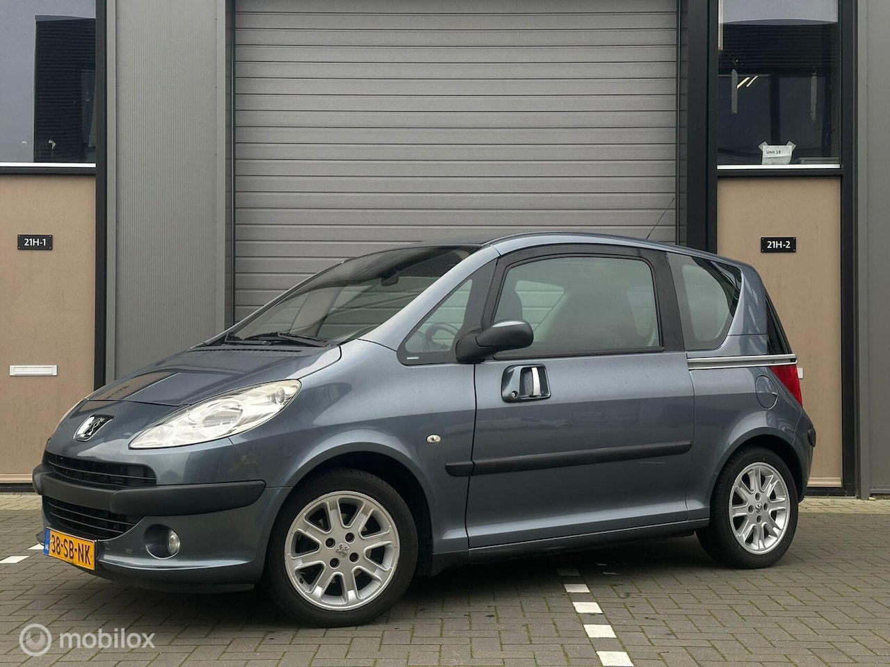 Peugeot 1007 - 1.4 75pk Automaat Elek Deuren Elek ramen airco - AutoWereld.nl