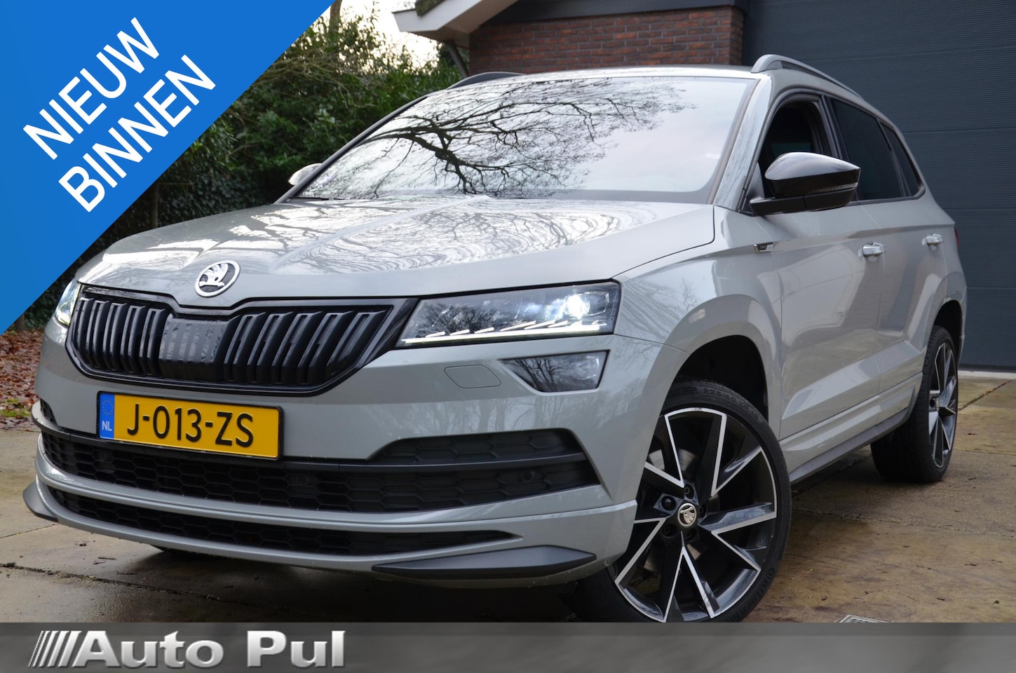 Skoda Karoq - 1.5 TSI ACT Sportline Business Automaat/Navi/Audio installatie premium/Led/Pdc/Ecc/Stuur&S - AutoWereld.nl