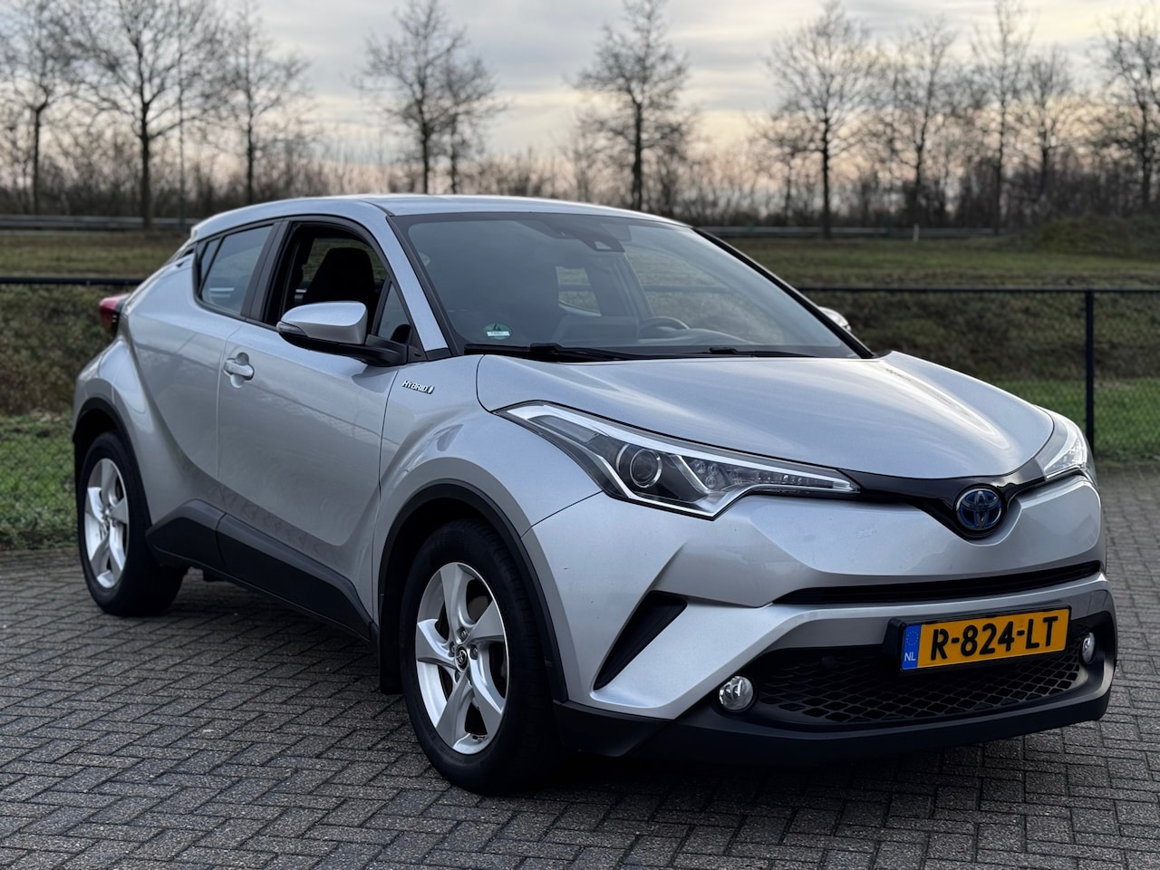 Toyota C-HR - 1.8 Hybrid Energy+DealerOnderhouden+AccupakketGarantie - AutoWereld.nl