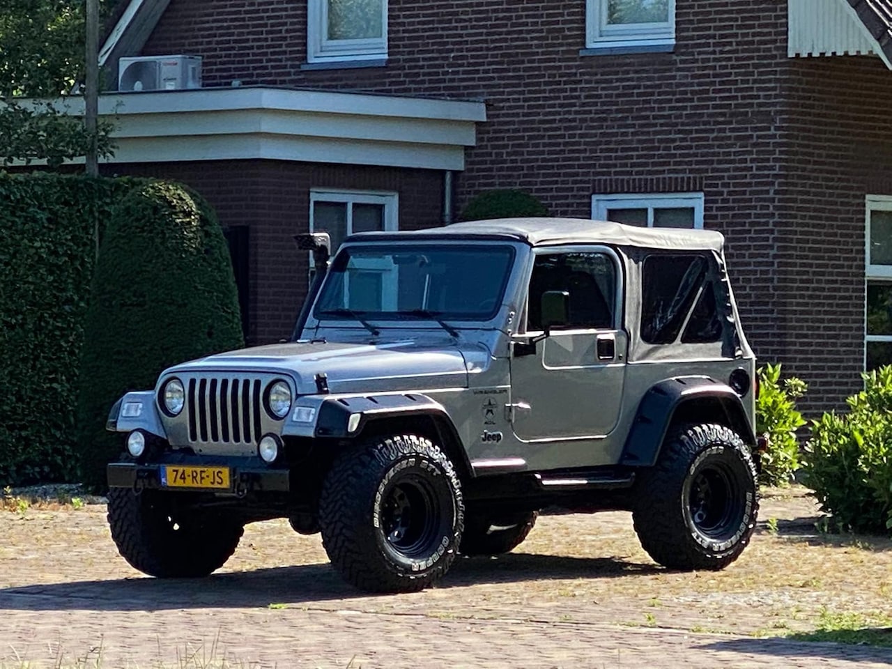 Jeep Wrangler - Automaat 4.0 Softtop + Hardtop | Extra Velgenset - AutoWereld.nl