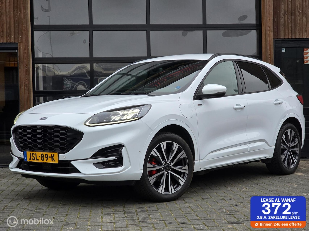 Ford Kuga - 2.5 PHEV ST-LINE ACC CAMERA V+A CARPLAY STOELVERW. - AutoWereld.nl
