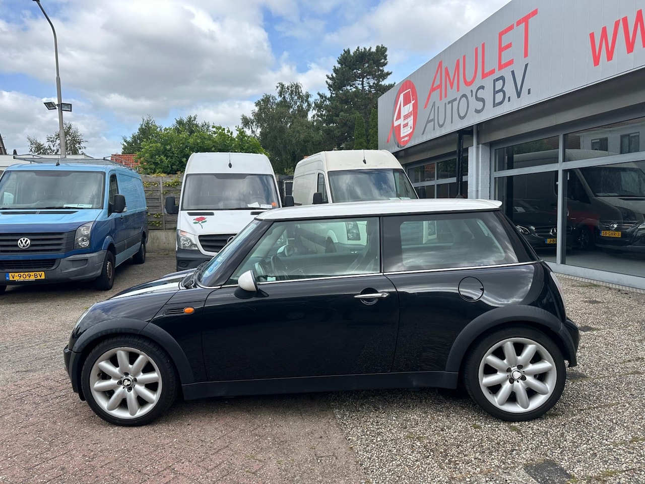 MINI Cooper - 1.6,85kw/115pk,Chili,2004: 1149,- - AutoWereld.nl