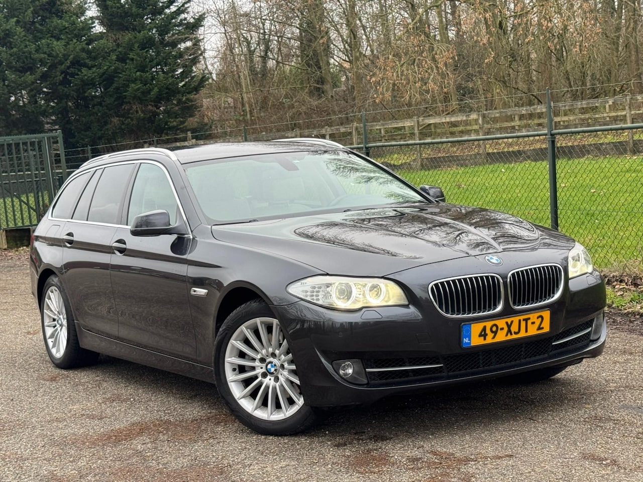 BMW 5-serie Touring - 520i High Executive /Xenon/Navi/Automaat/Trekhaak/ - AutoWereld.nl
