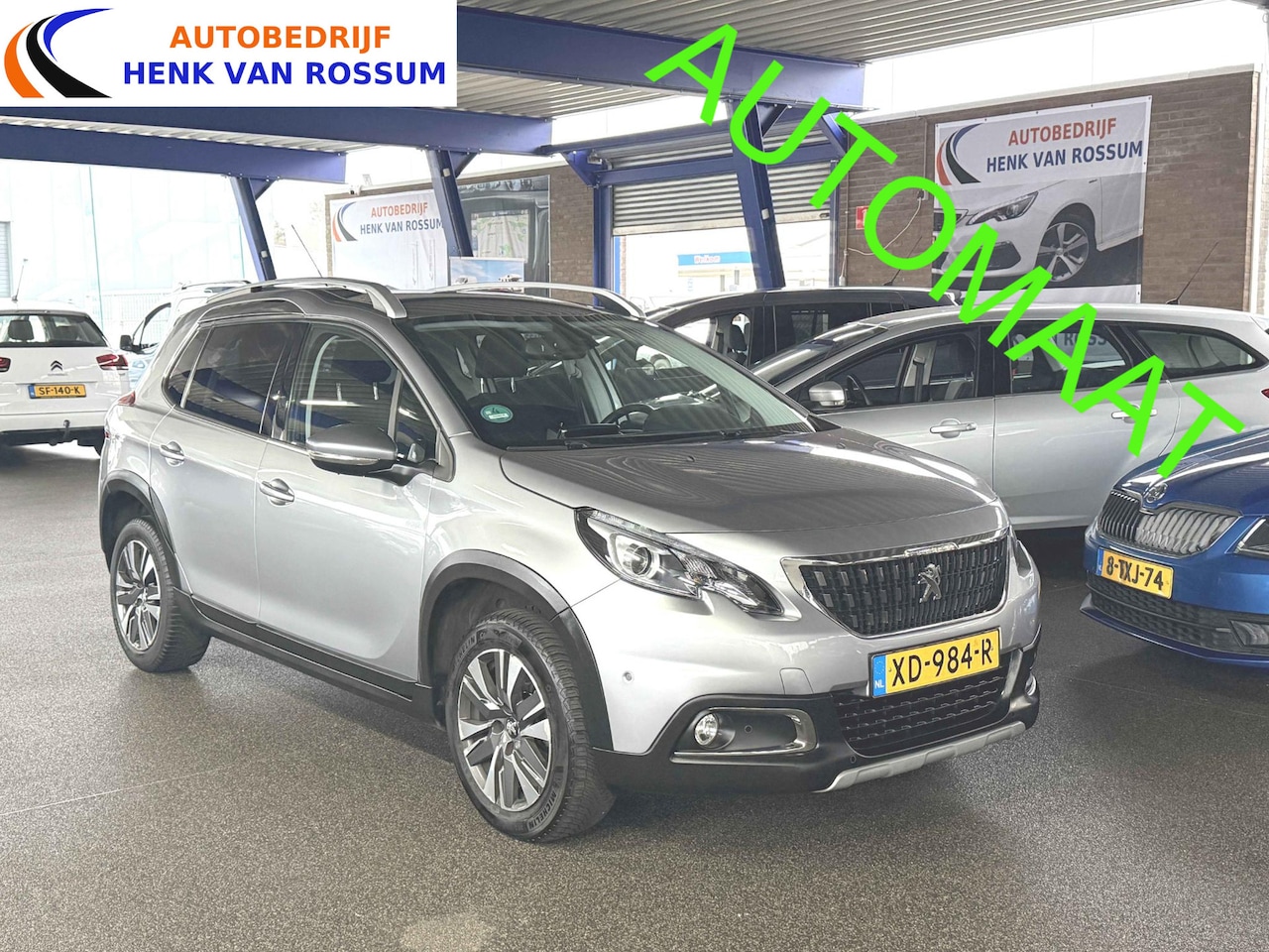 Peugeot 2008 - 1.2 PureTech Allure PDC voor en achter | Stoelverwarming | Clima | Cruise | Carplay. - AutoWereld.nl