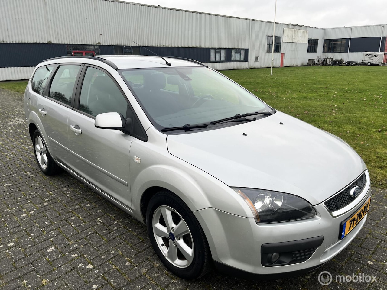 Ford Focus Wagon - 1.8-16V Ambiente Flexifuel / Trekhaak / PDC / Airco / Cruise / APK / NAP / Navi / - AutoWereld.nl