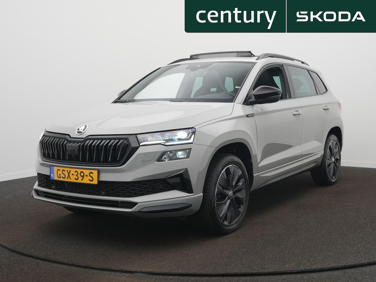 Skoda Karoq - 1.5 TSI ACT Sportline Business Automaat - Trekhaak - Camera - Panoramadak - AutoWereld.nl