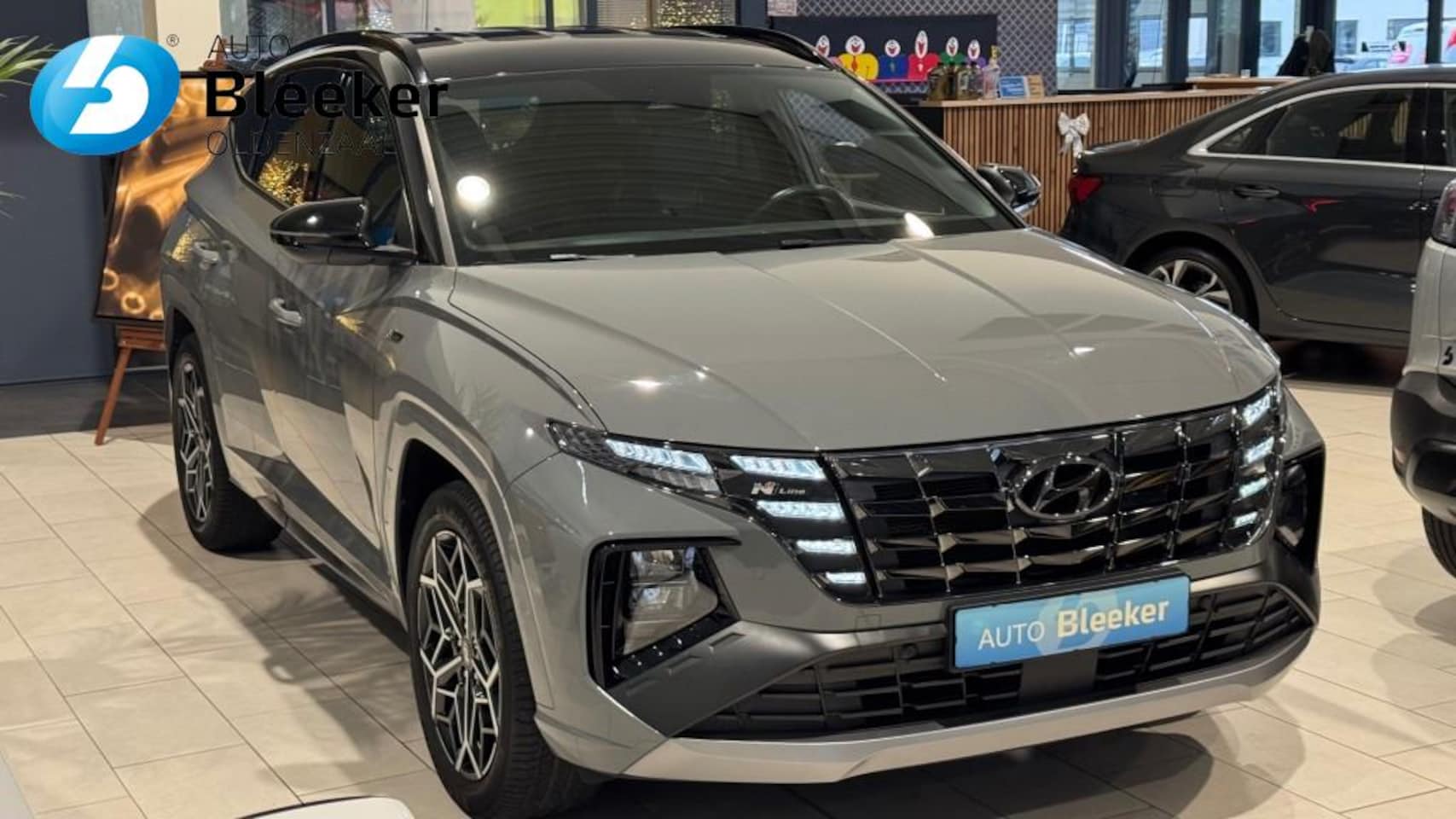 Hyundai Tucson - 1.6 T-GDI 265PK N Line 4WD Stoel en stuurverwarming Carplay Camera - AutoWereld.nl