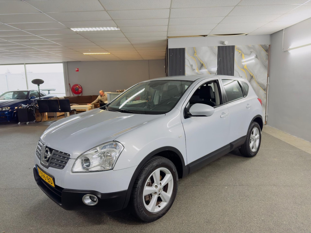 Nissan Qashqai - 1.6 Visia Apk Nieuw,2e Eigenaar,Clima,Cruise,N.A.P,Trekhaak,E-Ramen,2 sleutels+Boekjes,Top - AutoWereld.nl