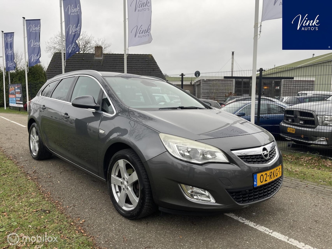 Opel Astra Sports Tourer - 1.4 Cosmo | Navigatie | Cruise Control | Trekhaak - AutoWereld.nl