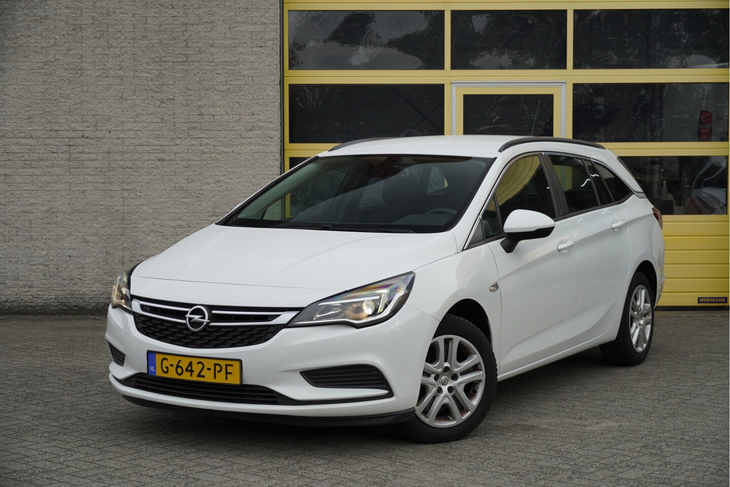 Opel Astra Sports Tourer - 1.0 Turbo Business BJ2019 Led | Pdc | Navi | Airco | Cruise control | Getint glas - AutoWereld.nl