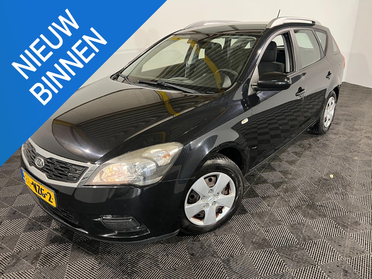 Kia Cee'd - 1.4 CVVT X-tra 1.4 CVVT X-tra - AutoWereld.nl