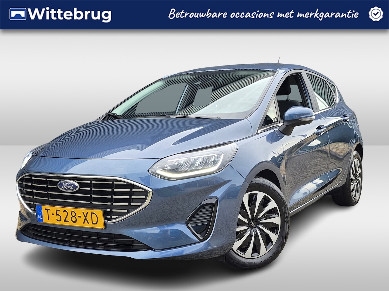 Ford Fiesta - 1.0 EcoBoost Hybrid Titanium | Parkeersensoren | Keyless Entry | Stoel en Stuurverwarming - AutoWereld.nl