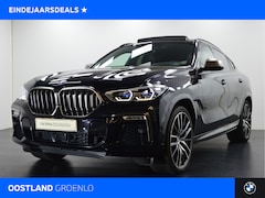 BMW X6 - M50i High Executive Automaat / Panoramadak Sky Lounge / Laserlight / Massagefunctie / Soft