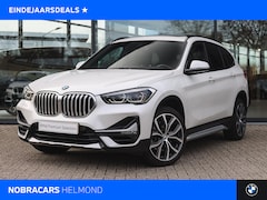 BMW X1 - sDrive20i High Executive xLine Automaat / Panoramadak / Trekhaak / Sportstoelen / Achterui