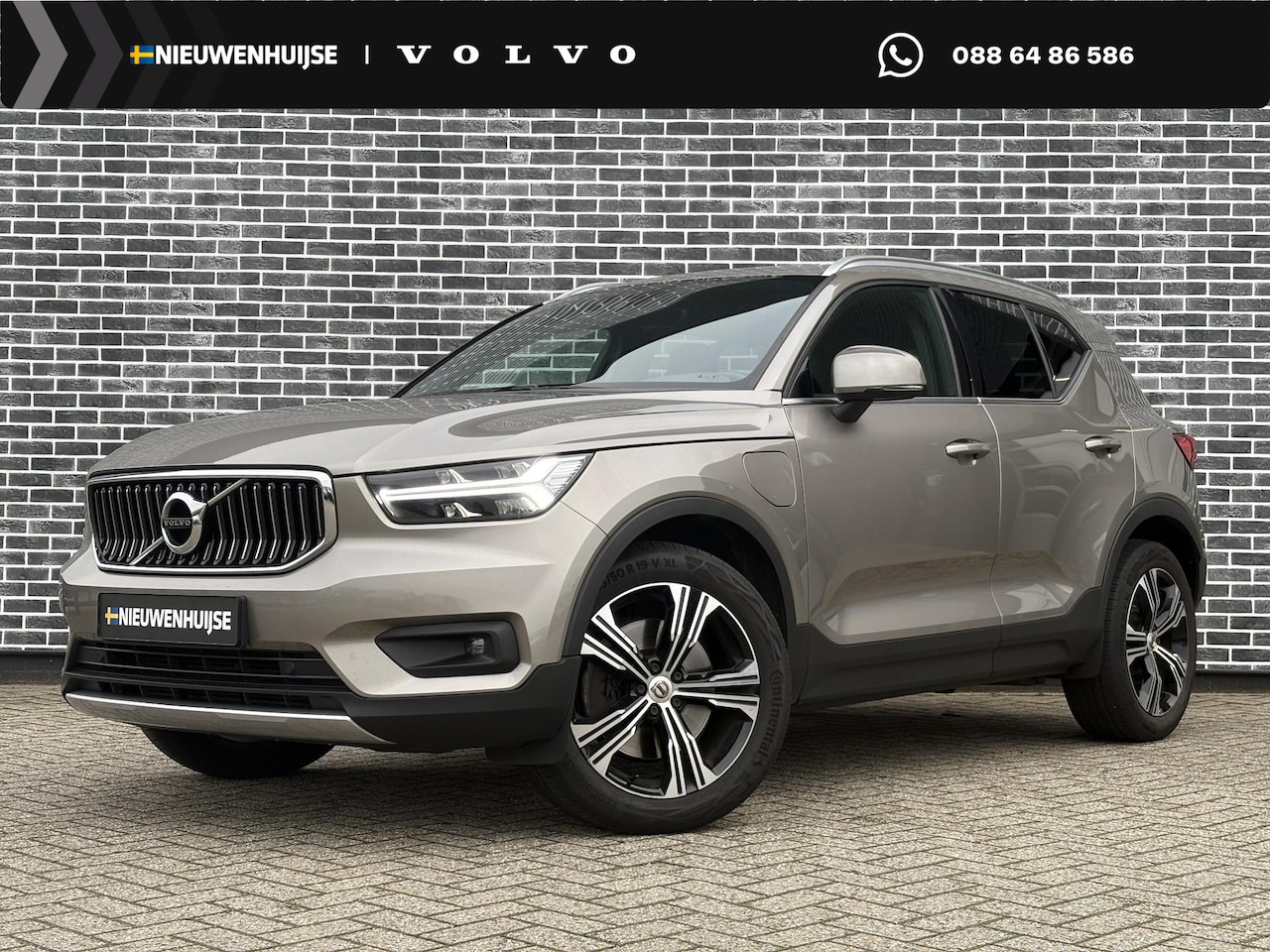 Volvo XC40 - 1.5 T5 Recharge Business Pro | Adaptieve cruise control | 19" wielen | Parkeerverwarming | - AutoWereld.nl