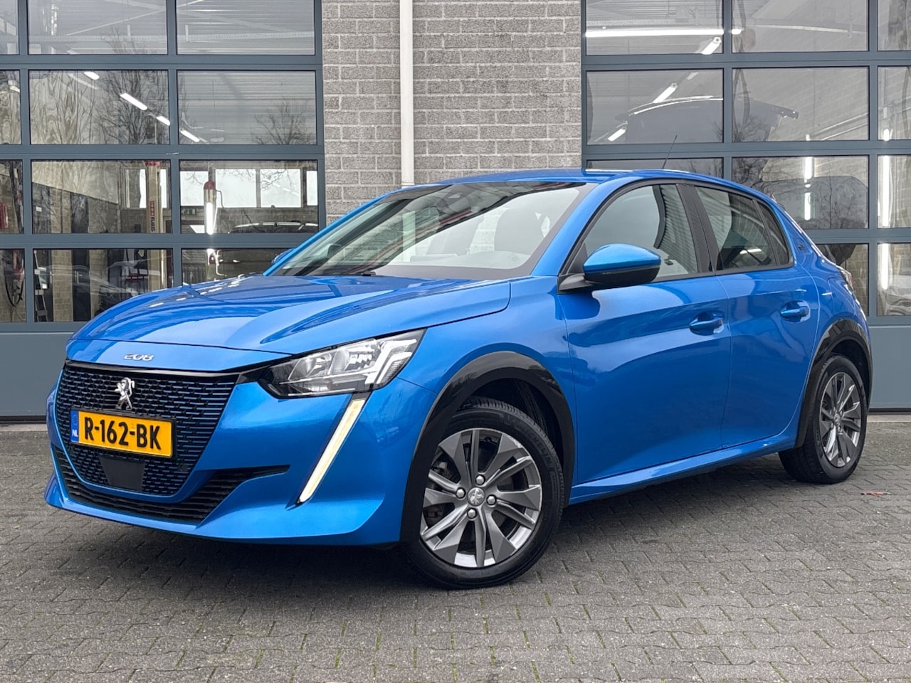 Peugeot e-208 - EV Allure 50 kWh|CAMERA|CLIMA|NAVI| - AutoWereld.nl