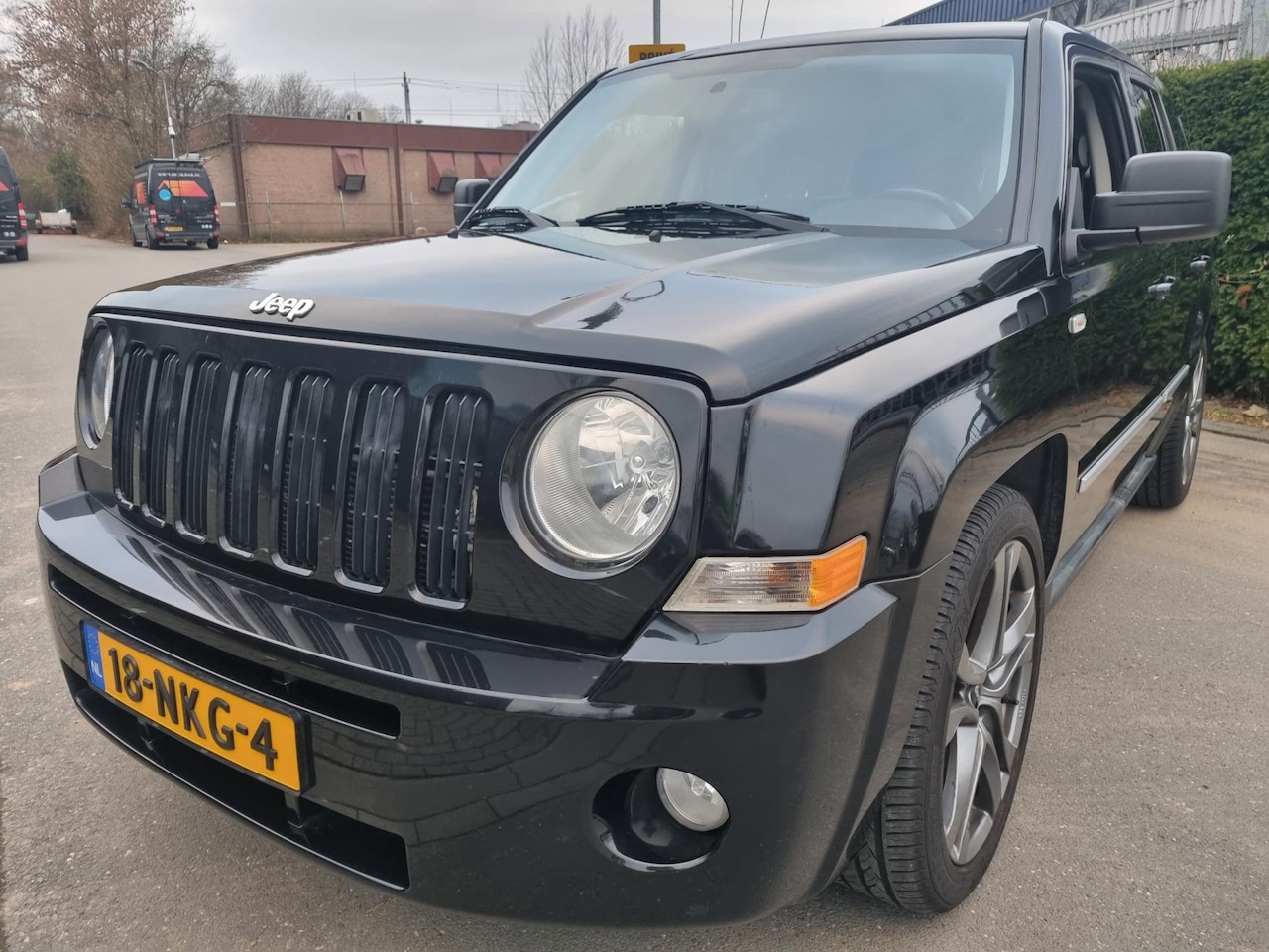 Jeep Patriot - 2.4 Limited Liberty Edition Leder Navi - AutoWereld.nl