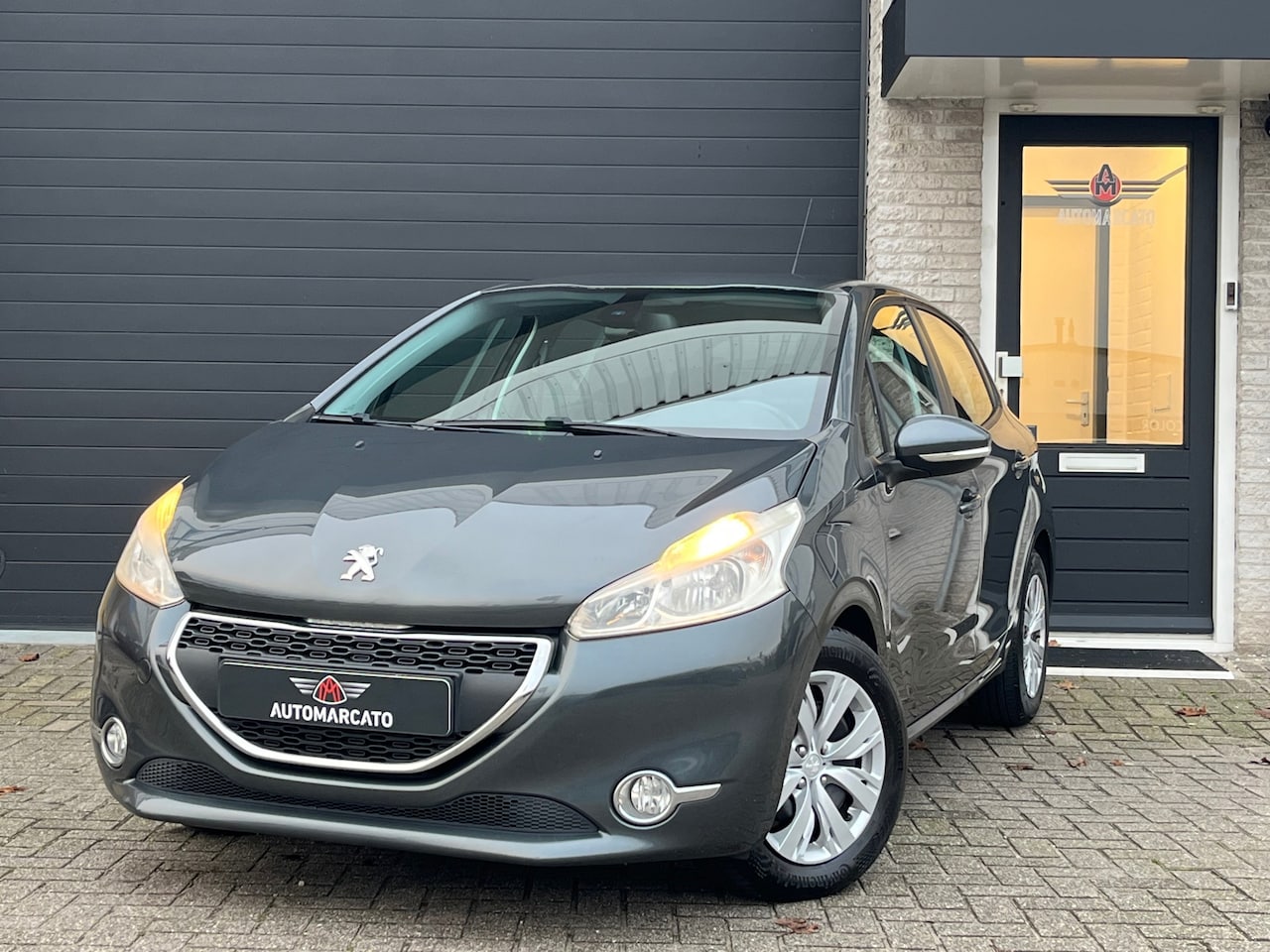 Peugeot 208 - 1.2 VTi Envy | 5drs | Navi | Cruise | Clima | PDC | ESP | Electric Pack | NAP | NL-Auto | - AutoWereld.nl